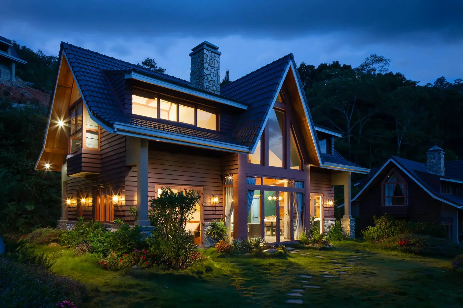 Architectural detail of a home's roof and exterior; illustrative photography